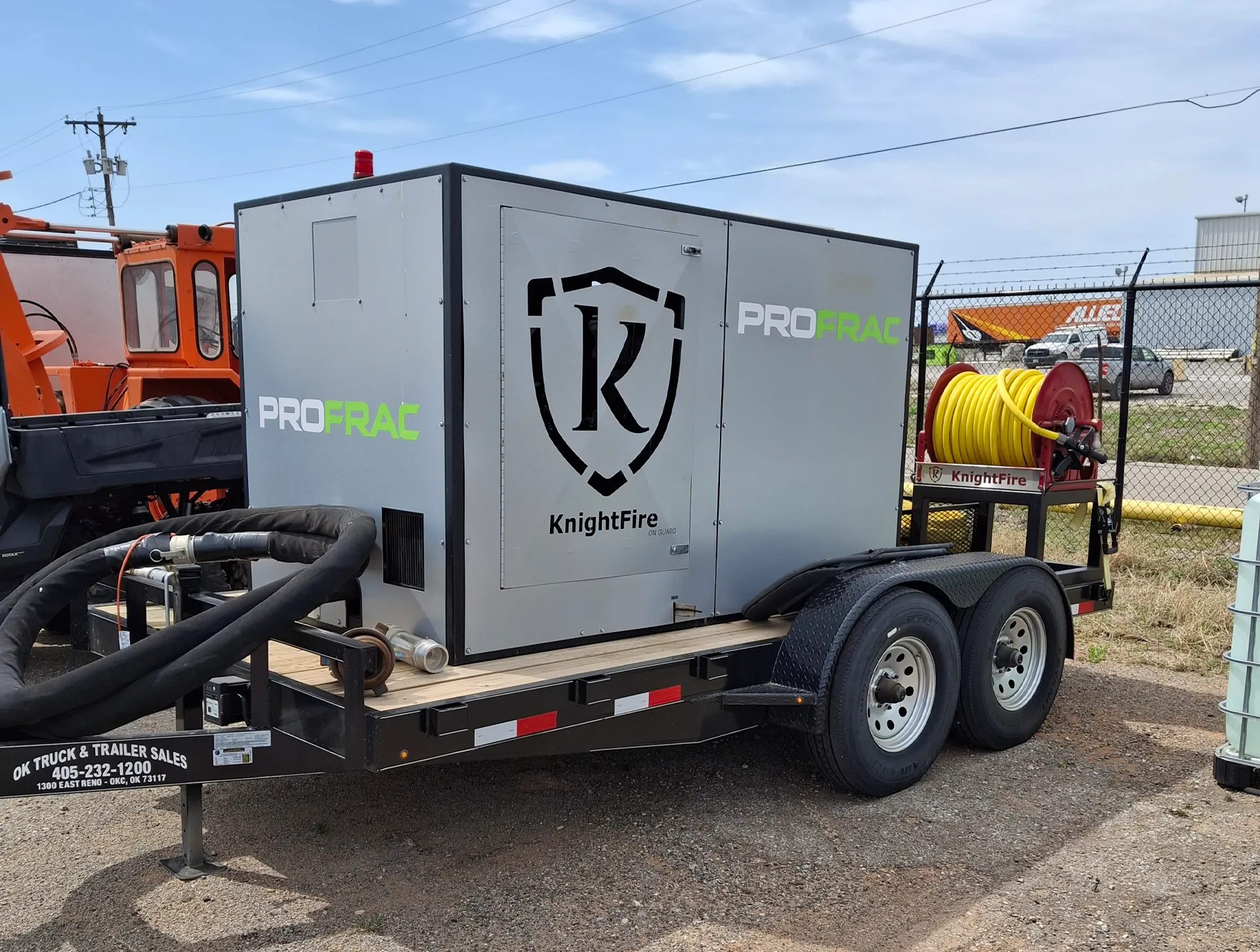 Knight Fire fire suppression system mounted on industrial equipment at an outdoor job site.